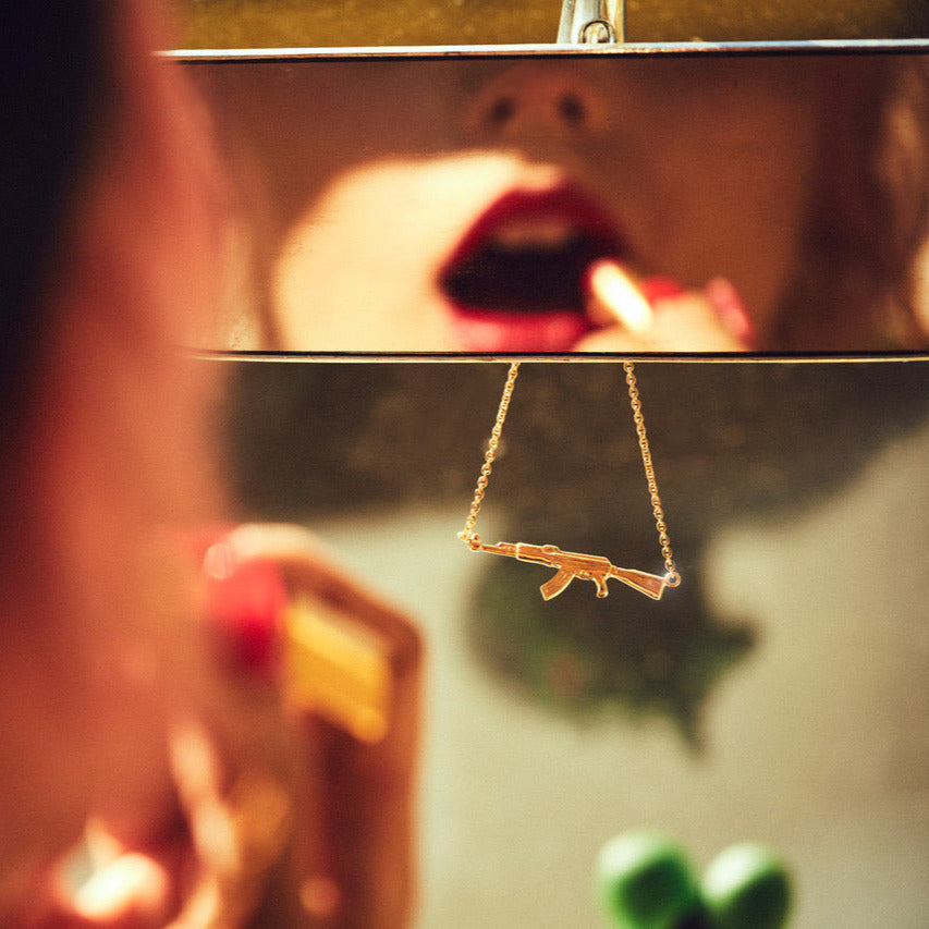 AK-47 necklace – Jonathan Johnson 